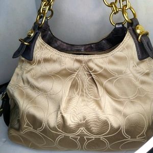 Beige and brown Coach handbag purse